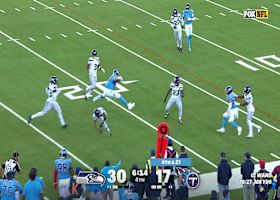 Gunnar Helm makes leaping hurdle over a Seahawk in quest for first down