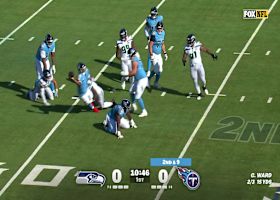 Cam Ward finds a way to complete a 10-yard pass while going down vs. Seahawks 