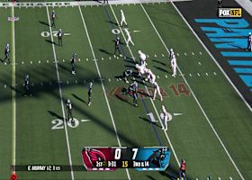 Kyler Murray climbs the pocket to evade Panthers defenders and earn the first down