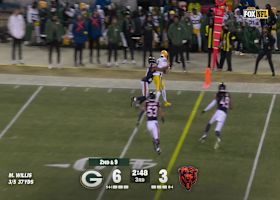 Christian Watson hauls in bobbling sideline grab