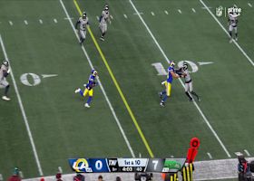 Stafford rolls out of the pocket to locate Mumpfield for 19 yards and red zone access