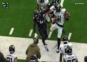 Parker Washington with a strong finish to a short 4-yard run