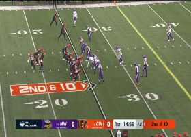 Chase Brown slips through several Vikes' defenders on 13-yard swing pass