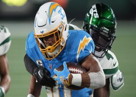 Austin Ekeler fights through facemask penalty on 20-yard run