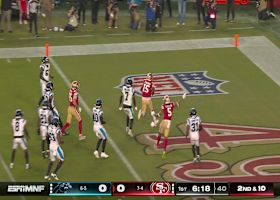 Jauan Jennings MUSCLES his way through three Panthers defenders for TD