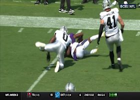 Lamar Jackson evades sack, throws across his body for 21-yard connection with Zay Flowers