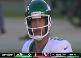 Rodgers cracks a smile after his 14-yard zip-line pass to Wilson moves chains