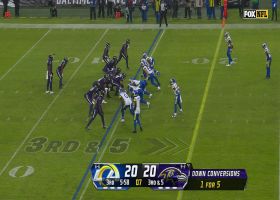 Lamar Jackson boots football into stands following ill-timed snap for a Rams safety