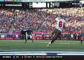 Mayfield dodges a potential safety and scrambles for chain-moving pickup