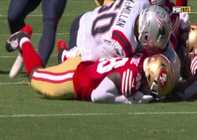 Isaac Guerendo collides with another 49er, causing a fumble that's recovered by Pats