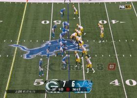 Christian Watson climbs the ladder to secure 9-yard gain