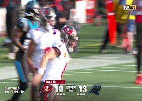 Baker Mayfield scoots for a 23-yard gain