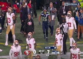 Charbonnet powers through a 15-yard rush vs. 49ers