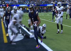 Quentin Johnston breaks two tackles and finds his way into end zone to open scoring in LA