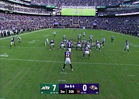Zay Flower tries to juke several Jet defenders at end of 20-yard catch