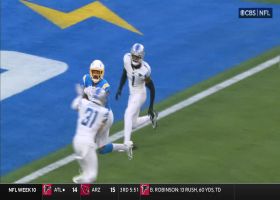 Herbert's 18-yard TD laser to Guyton fits into tightest of windows