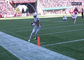 Taylor tightropes for pylon-reach TD after catching Richardson's pass