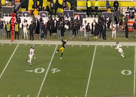 Adam Thielen stretches to snag a high ball from Rodgers on 21-yard gain